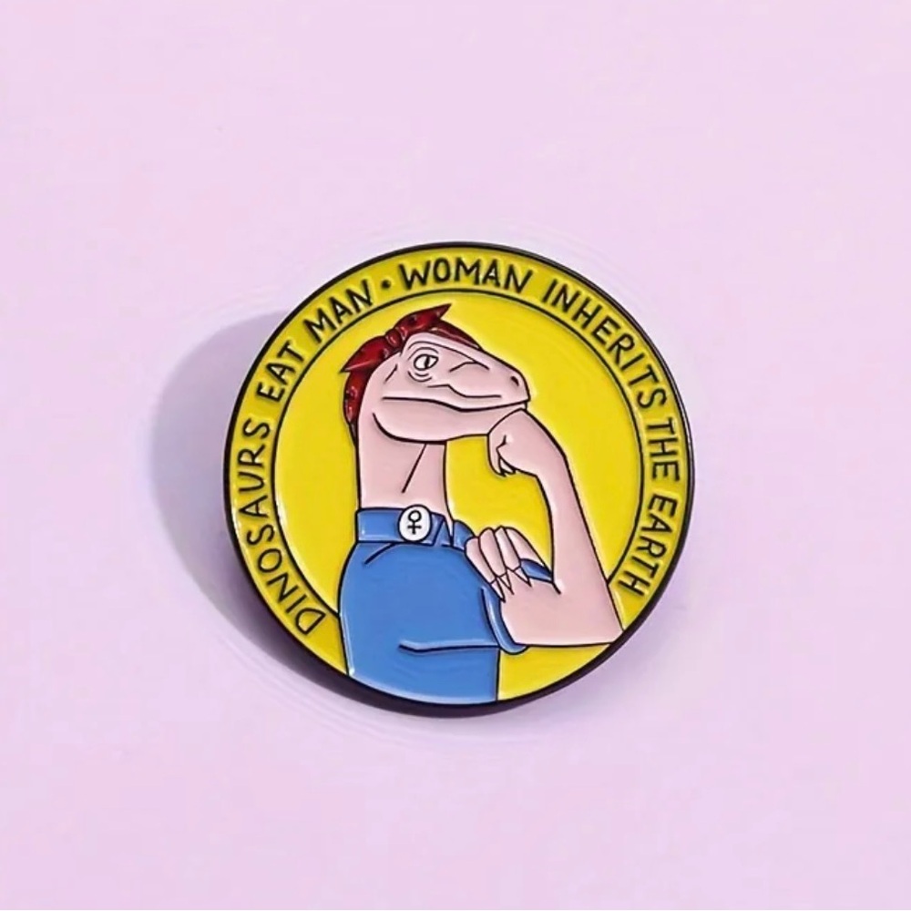 Jurassic park dinosaur eats man woman inherits the earth movie quote enamel pin